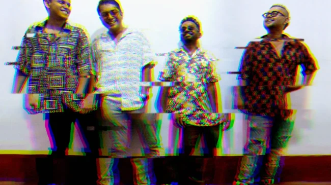 Many Roots Ensemble's "Echoes of Origin" Is A Musical Joyride Through Global Grooves and Infectious Beats